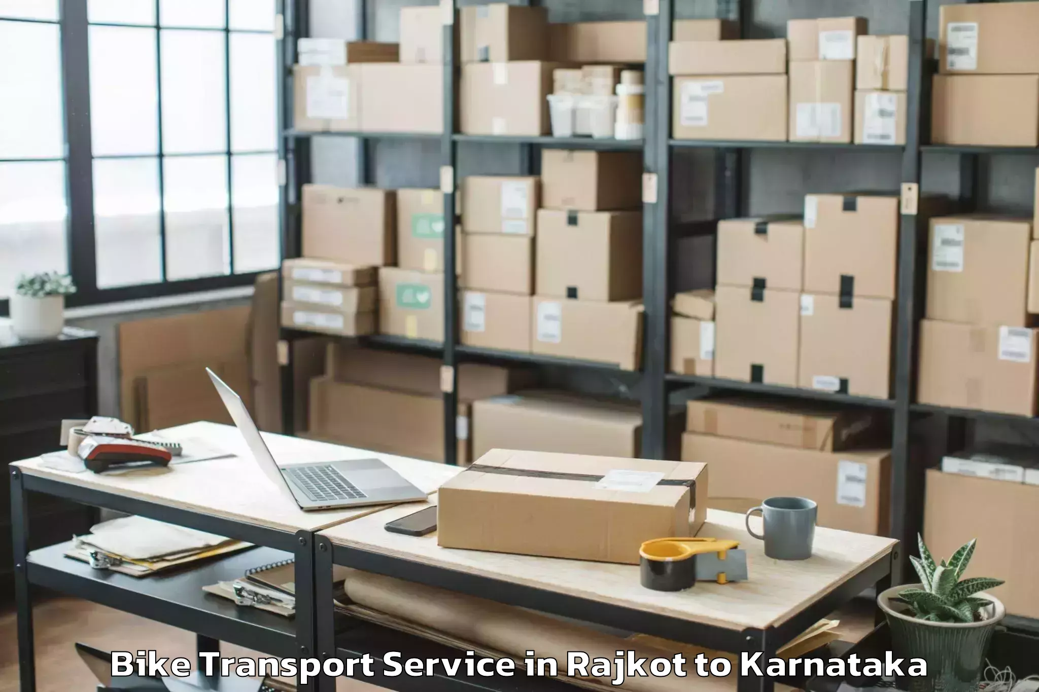 Book Rajkot to Visvesvaraya Technological Uni Bike Transport Online